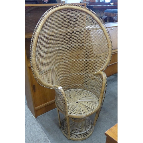 60 - An Italian wicker peacock shaped chair