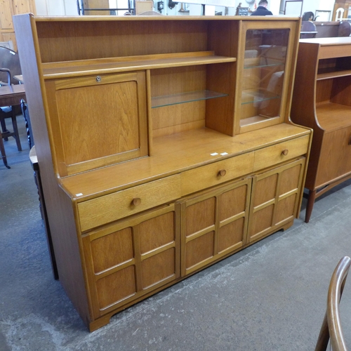 67 - A Nathan teak highboard