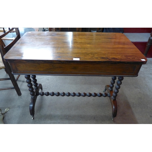 78 - A Victorian rosewood single drawer stretcher table