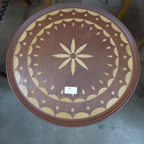 80 - A Victorian Aesthetic Movement occasional table, on copper and brass stand