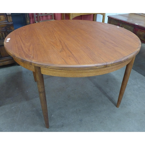 9 - A G-Plan Fresco teak circular extending dining table