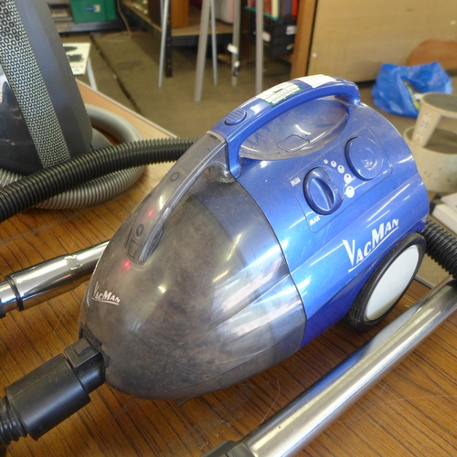 2197 - A Sebo Airbelt K1 Pro Eco cylinder vacuum cleaner and a Vacman vacuum cleaner