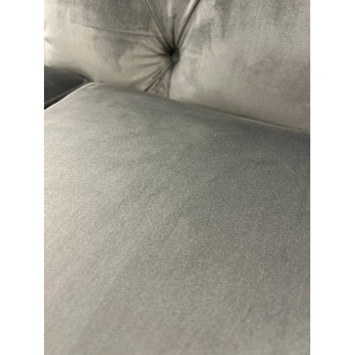 1467 - A grey velvet Chesterfield three seater sofa