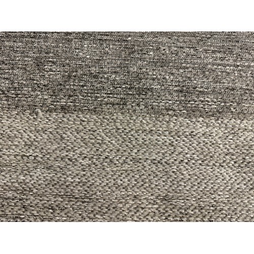 1506 - A cream ground, textured weave designer carpet, 300cm x 200cm