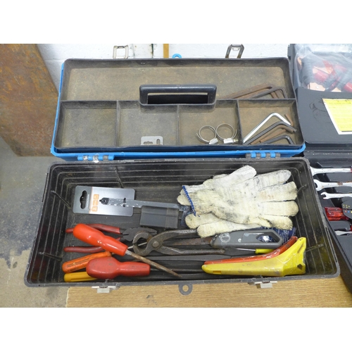 2004 - A plastic tool box with small amount of tools and an in-car SOS kit including spanner set and jump s... 