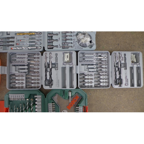 2025 - A box containing a large amount of drill bit sets