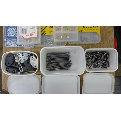 2033 - A tray of assorted hardware including nails, screws, washer sets and a Record G-clamp