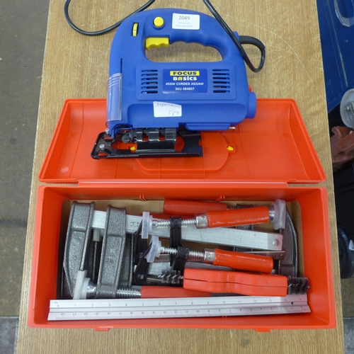 2049 - A Focus Basics 450w jigsaw and toolbox of  F-clamps