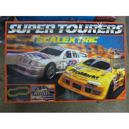 2066 - 2 Scalextric sets; Super Tourers, Emergency Pursuit Micro and a bag of assorted track