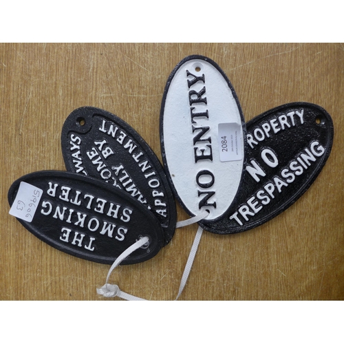 2084 - Four oval cast iron signs No entry, No trespassing no smoking and friends welcome * this lot is subj... 