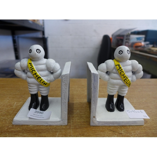 2090 - Black and white Michelin bookends * this lot is subject to VAT