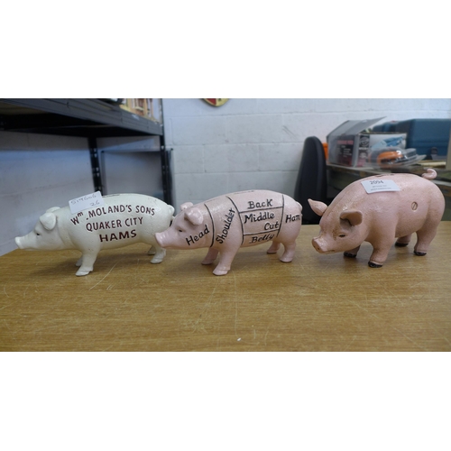 2094 - Three pig banks * this lot is subject to VAT