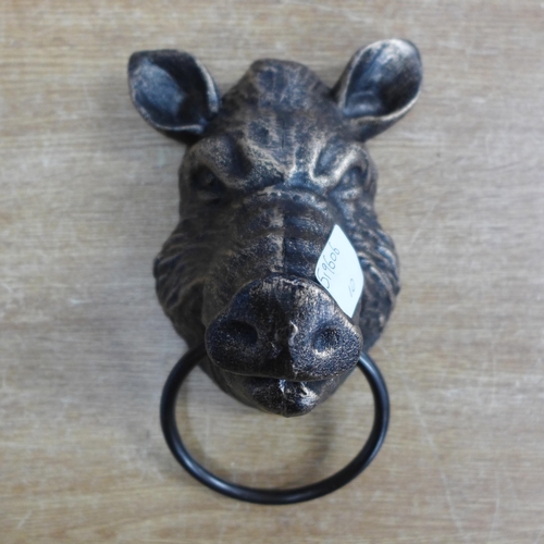 2109 - A boar's head with metal ring * this lot is subject to VAT