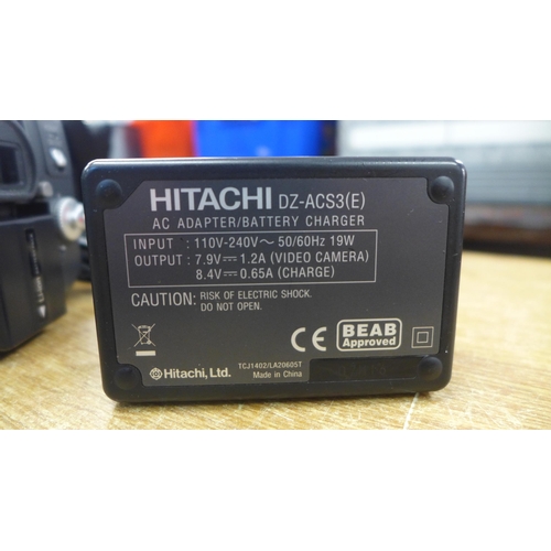 2148 - A Hitachi Hi-Brid camera, with case and charger