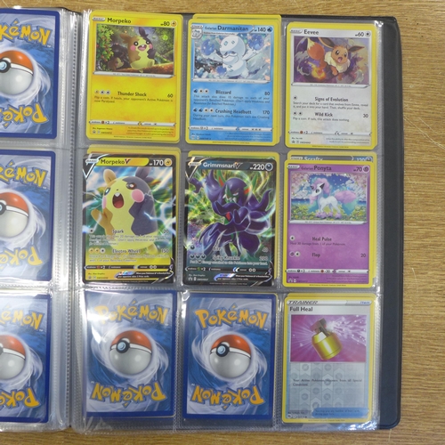 2157 - Approx. 80 Pokemon cards in a folder