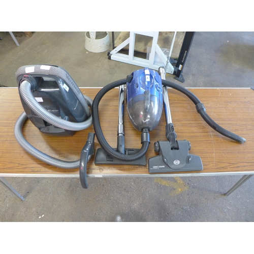 2197 - A Sebo Airbelt K1 Pro Eco cylinder vacuum cleaner and a Vacman vacuum cleaner