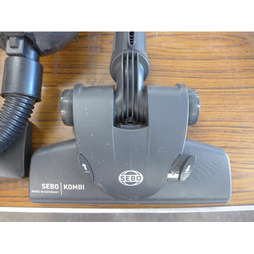 2197 - A Sebo Airbelt K1 Pro Eco cylinder vacuum cleaner and a Vacman vacuum cleaner