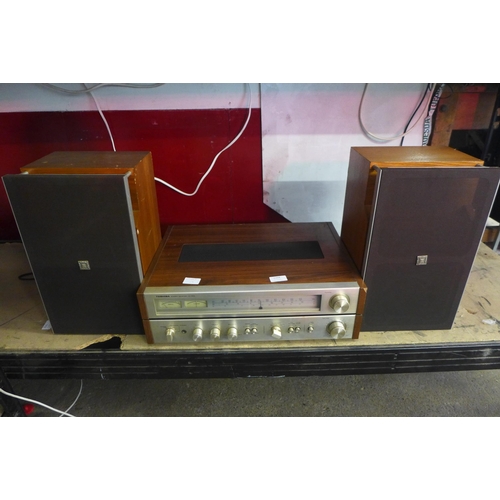 2204 - A Toshiba SA320L stereo receiver tuner and a pair of Revox BX230 speakers