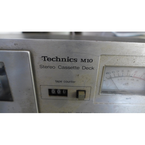 2218 - A Technics M10 stereo cassette deck and Rotel RD-300 stereo cassette deck