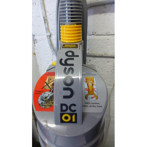 2234 - A Dyson dc01 upright vacuum cleaner