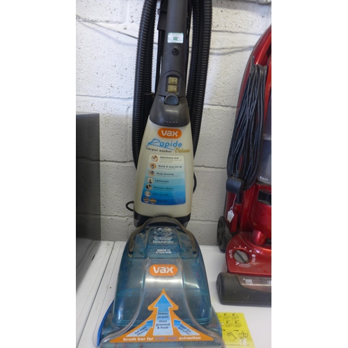 2235 - A Bissell bagless lift-off vacuum cleaner and a Vax Rapide carpet cleaner