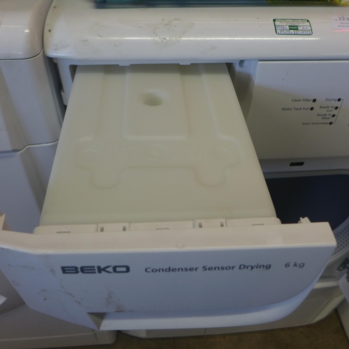 2237 - A Beko 6kg condenser tumble dryer (model DRCS-68W)