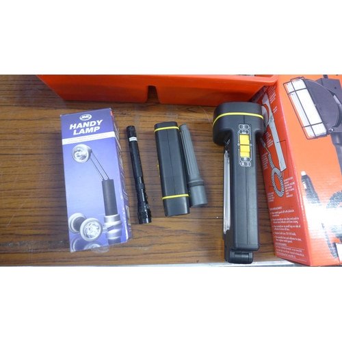 2330 - A box of assorted lights and torches with box of miscellaneous including oil cans, clips, cake joint... 