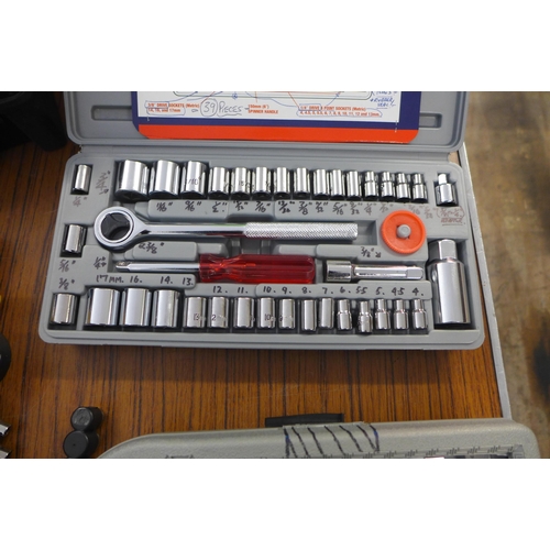 2363 - A box of assorted socket sets, sockets and empty tool boxes and organizer cases