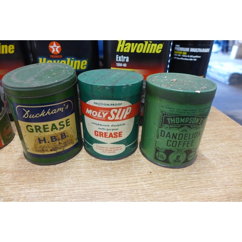 2373 - Two boxes of assorted motor oils, and vintage tins including Dunlop tire repair kit and major tube r... 