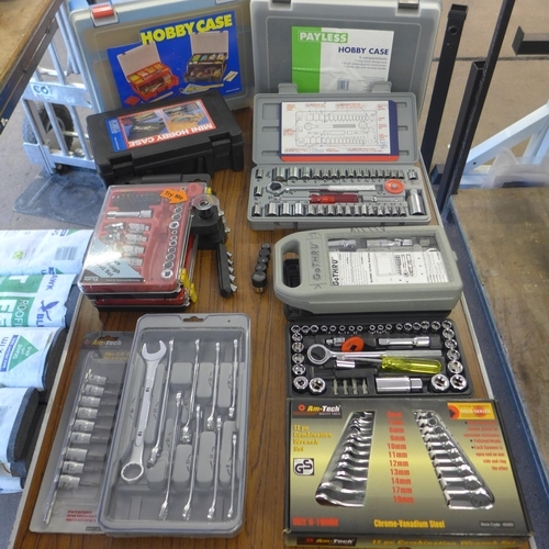 2363 - A box of assorted socket sets, sockets and empty tool boxes and organizer cases