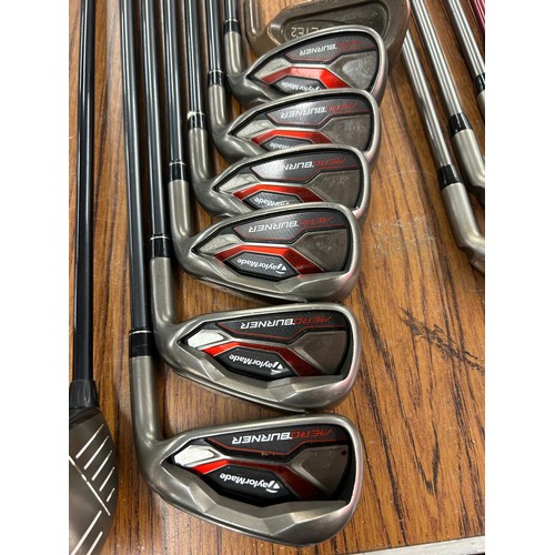 2264 - A Titleist golf bag with a set of Taylor Made Aero Burners graphite shaft irons (6,7,8,9,pw,sw) ping... 