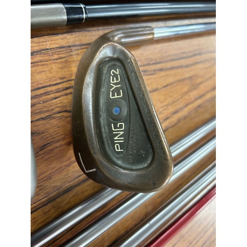 2264 - A Titleist golf bag with a set of Taylor Made Aero Burners graphite shaft irons (6,7,8,9,pw,sw) ping... 