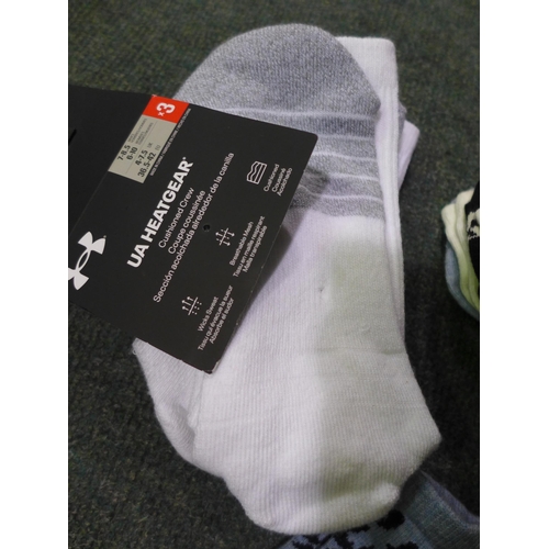 3044 - Assorted women's DKNY and Under Armour socks. *This lot is subject to VAT