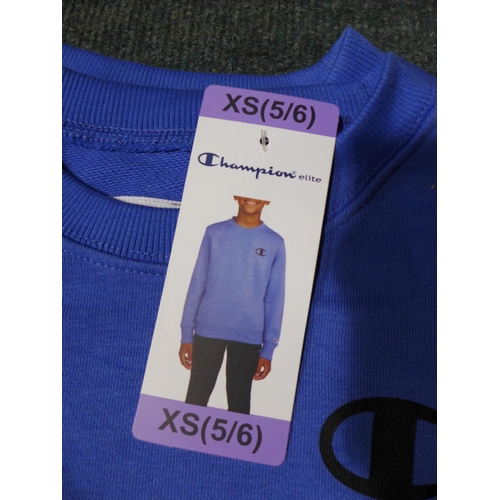 3265 - A quantity of boy's blue Champion jumpers, mixed sizes. *This lot is subject to VAT