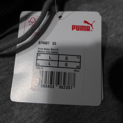 3269 - A quantity of men's grey Puma shorts, mixed sizes. *This lot is subject to VAT