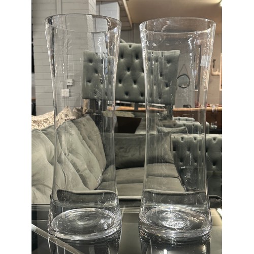 1417 - A pair of tall clear glass vases