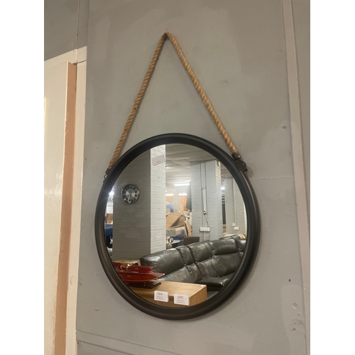 1372 - A medium round black metal mirror on a hanging rope H46cm (JRG1809)