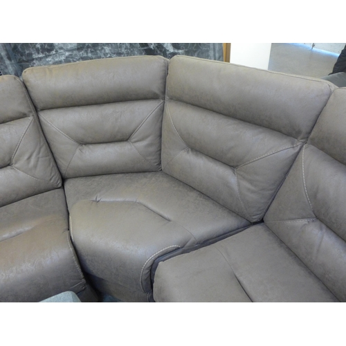 1331 - A Justin brown sectional reclining sofa, original RRP £1833.33 +VAT (4188-18), Damage to cables*This... 