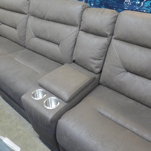 1331 - A Justin brown sectional reclining sofa, original RRP £1833.33 +VAT (4188-18), Damage to cables*This... 