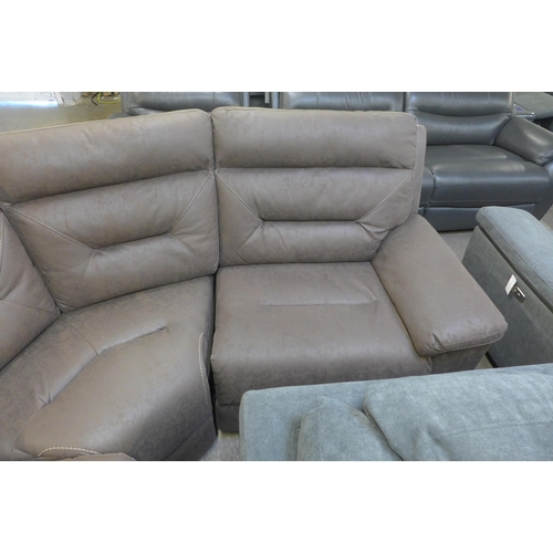 1331 - A Justin brown sectional reclining sofa, original RRP £1833.33 +VAT (4188-18), Damage to cables*This... 