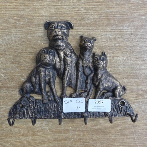 2128 - A dogs cup rack * this lot is subject to VAT