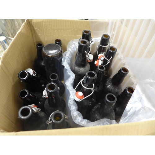 2527 - A box of 18 brown glass pop top drinks bottles