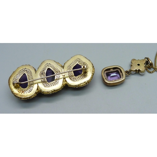 1005 - A silver gilt pendant on chain and a silver and quartz brooch