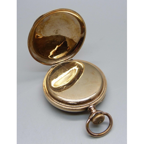 1007 - A Waltham top-wind pocket watch in a 10ct rolled gold case, case back bears monogram