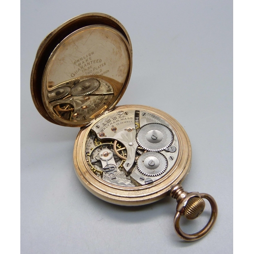 1007 - A Waltham top-wind pocket watch in a 10ct rolled gold case, case back bears monogram