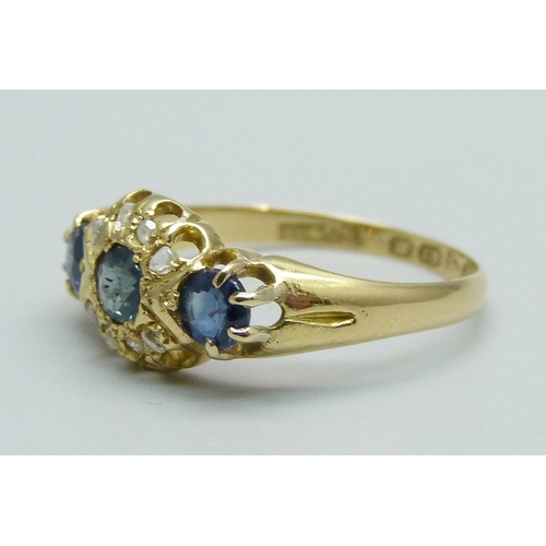 1009 - An 18ct gold, sapphire and diamond ring, Chester 1912, 2.2g, N