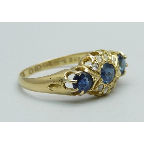 1009 - An 18ct gold, sapphire and diamond ring, Chester 1912, 2.2g, N