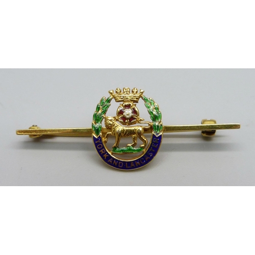 1012 - A 9ct gold and enamel military sweetheart brooch in fitted case, York and Lancaster Regiment, 4g