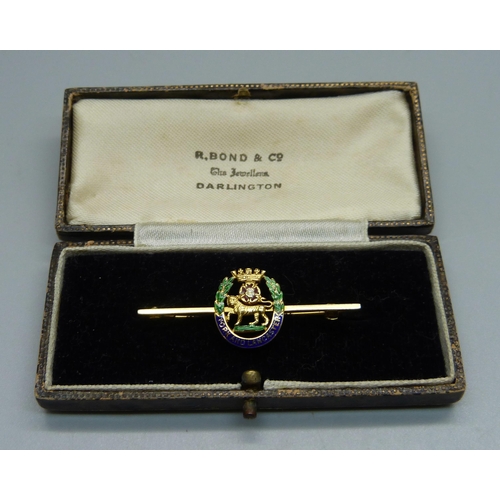 1012 - A 9ct gold and enamel military sweetheart brooch in fitted case, York and Lancaster Regiment, 4g