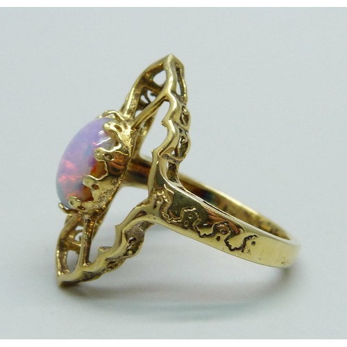 1013 - A silver gilt dress ring, O